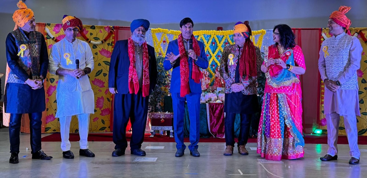 Shivraj Singh speaking at a Tri-Valley cultural celebration on stage